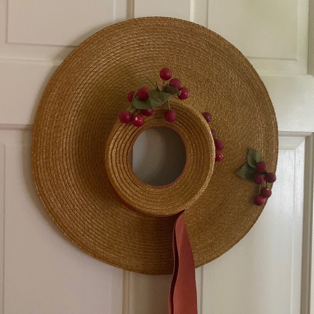 Vintage straw hat embellished with faux cherries